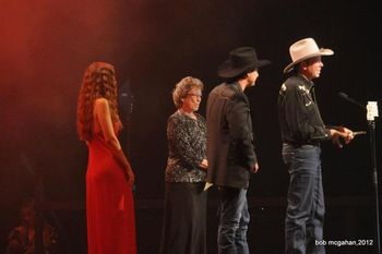 Joy McKean awarding Lee Kernaghan & Dean, the Golden Guitar for Bush Ballad Of The Year, Tamwoth 2012

