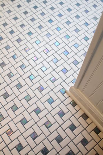 Custom Tile Work, I had to blend the grout colour myself to match the iridescent tiles
