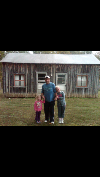 Me and my girls in front of the house where my dad and his family were raised.  Irvine, KY
