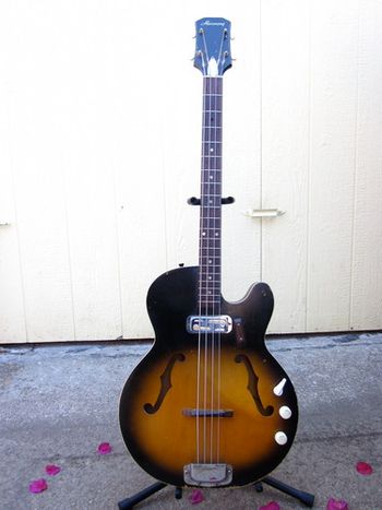 '66 Harmony H-22, strung with rounds.
