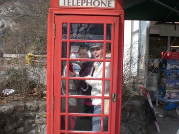 It just wouldn't be right not to stand in the phone booth!
