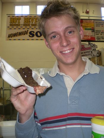 Jonathan trying chocolate covered bacon at the state fair. Yuck!
