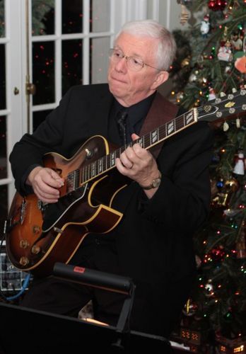 Dick playing his Gibson 175 at Christmas Gig
