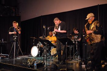 At The Rotunda - 2012 - From left to right, Denis Beuret - Bass Trombone, Marc Edwards - Drums, Elliott Levin - Saxophone, Weasel Walter - Drums, and Marshall Allen - Saxophone
