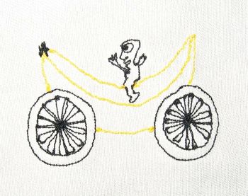 Baby on a banana bicycle
