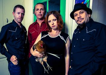 Yes, I am holding a mother F*%#ing chicken. Photo by Matt Adamik.
