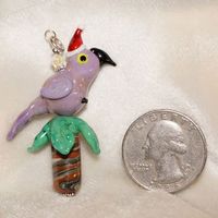 TJEG-0002 Small Purple Parrot in a Palm Tree