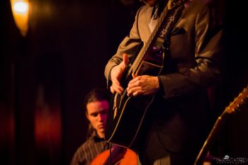 On Stage - Adam Meachem with Guitar and Cello
