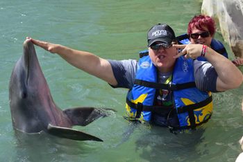 Keith and Bobbi Lynn, swimming with the Dolphins

