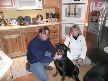 This is Scott, Sharon and Summer.  Summer came out of a local breeding kennel after eight years with numerous medical problems. She is now loving life with her forever family along with her "brother" Toby!

