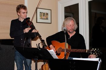 Ben Hoyt and I tune up before a house concert.
