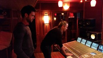Keith Elliott, left, and Jakael Tristram listen intently to playback for the David Nyro EP "Writer of Wrongs, Singer of Songs"
