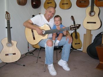 Gary and one of his two guitar techs at Hans Pukke's shop with a fabulous nylon 7 string.
