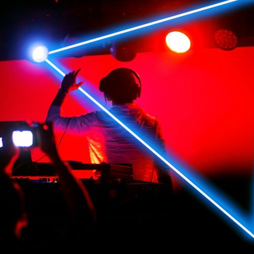 Julio Caezar DJ Performance with blue & red lights