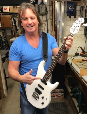 MUSICMAN "LUKE"  If it's good enough for Steve Lukather then it's good enough for me!      It's become one of my main stage guitars and very versatile.

