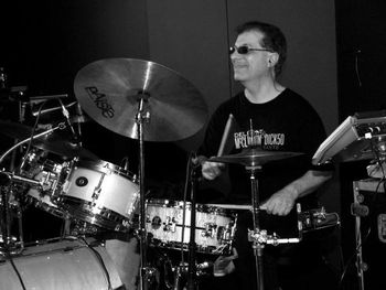 Ron Ouimette (Wemet) Ron O, The backbone and foundation of the band. Loves to groove with color & spice.

