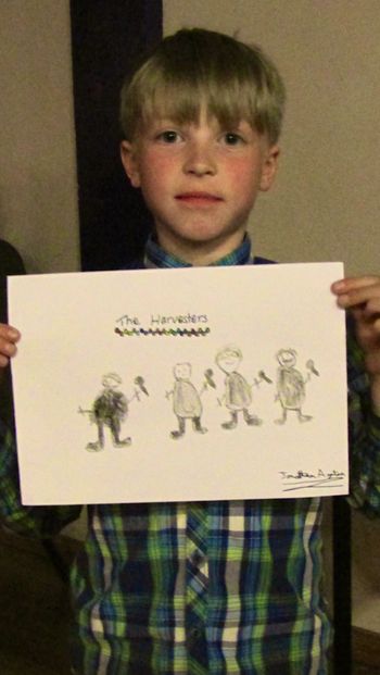 Jonathan Ayrton showing off his drawing of The Harvesters. A little to accurate for comfort, in regard to the 'rotund' nature of some of those portrayed!
