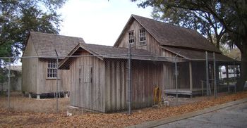 Clear view of the other structures that made up the Cracker homestead. Some of these were the outhouse, the kitchen, a smoke house, and a corncrib.