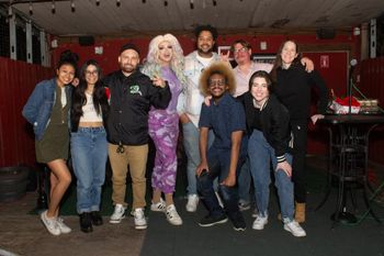 Group photo of all the performers at Symply Courtney's 5th Annual Birthday Roast on Feb 8, 2024 at the Tiniest Bar in Texas in Austin, TX. From left to right: Anastacia, Destiny Lalane, Dizzy, Tiffany Epiphany, Symply Courtney, Jose Da'Hype, Bryant Smith, Grace Morton, DJ Monikkrome.
