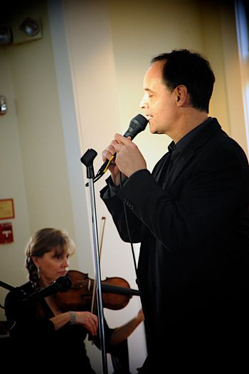 Mike sings at the February  concert
