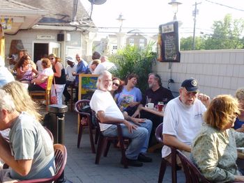 Wall-to-wall friends, family and fans at Popei's - it's Sunday on the deck with the Rhythm Kings!
