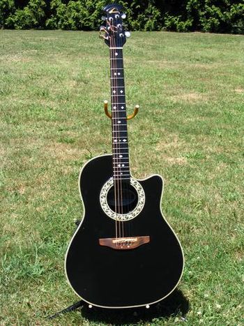 Currently my Number One acoustic for gigging in the Old Standard Tuning, this Ovation Custom Balladeer, model 1862, #360380 is usually set up for the New Standard Tuning introduced by Robert Fripp through Guitar Craft. It is upgraded with a Corian nut (the Coyote's paw-work) and the Coyote Bridge Upgrade (a Cipriani adjustable bridge and a Highlander transducer). It will soon return to the New Standard Tuning.
