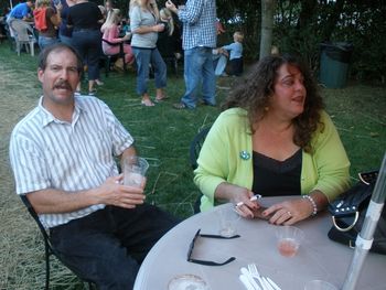 Brian and Barbara kick back, bask in the autumn sunbeams and enjoy the brews and band.
