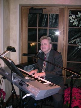 Jay Isaacson performs for a Christmas party at Western Racquet Club, Elm Grove, Wisconsin.
