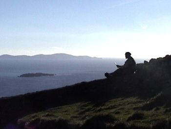 Garry drawing a picture of the view while on The Ring of Kerry
