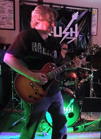 Keith Lenn playing guitar on a CRUSH tune
