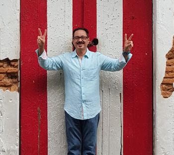© 2016 SAM Photo of Sixto infront of bandera-puerta in San Juan, PR
