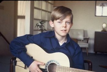 10 years old, first guitar

