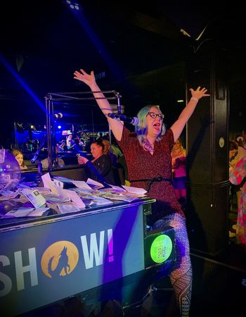 Photo 2: Kate LaRocque from Alberta, Canada soaking in the applause at Howl at the Moon, Streeterville, Chicago for the Piano Ladies Summit 2022
