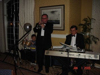 New Years Eve at Stage Neck Inn December 2004. Jeff Stout on Trumpet Myself Carl Reppucci on Piano and my son on congas.
