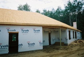 Roof sheathing on covered kennel area.
