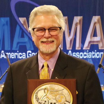 Glen Gobel with the MAGMA Lifetime Achievement Award.
