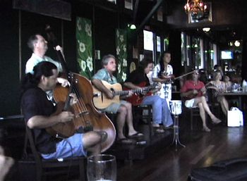 Playing with one of Hawaii's top Jazz bands, Gypsy Pacific. These guys are great players, we had so much fun playing together. Me on ukulele, Marcus Johnson, Phil Benoit, Tom Conway, and Willie Wainright. 8/08
