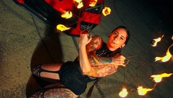 Fire performance artist Christy Belle on set of "Phoenix"
