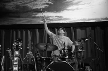 "With one stick keepin' the beat..." Jeremy on drums at the Hook (David Tanner, photographer)
