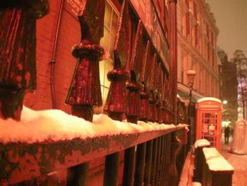 The red glow of the Windmill shines over the snow outside the stage door of the Lyric Theatre. The snow made London look so beautiful, and the transport chaos!
