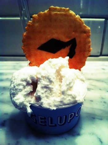 Coconut sorbet accompanying an awesome cappuccino at Gelupo. Yummy!!
