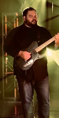 Brad McCracken - Lead Guitar<p>
PREVIOUS BANDS: Hyjinx, Party Fowl<p>
FAVORITE BANDS: Dream Theater<p>
GEAR: Bogner amps, Luxxtone custom guitars, TC Electronic pedals, Black Cherry White Claw, Truly.