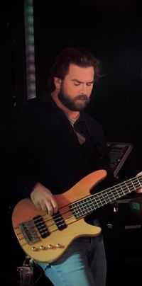 Nick Walker - Bass, Vocals<p>
PREVIOUS BANDS: Midnight Social, Stache, Technical V<p>
FAVORITE BANDS: Van Halen, Anberlin, Breaking Benjamin<p>
GEAR: Ibanez basses, Mackie amps, Shure microphones & monitors, I don't change my bass strings, IPA & Rolling Rock.