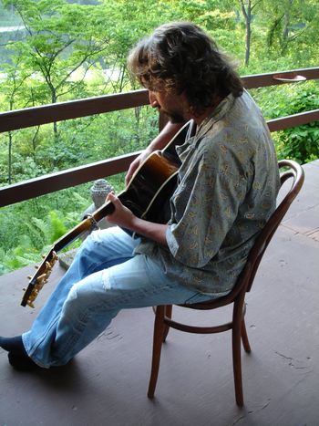 Playin’ it softly at my mom’s house in her wooded hideaway just outside of Sturgis, Michigan.  Photo by Aphrodite Rawlings
