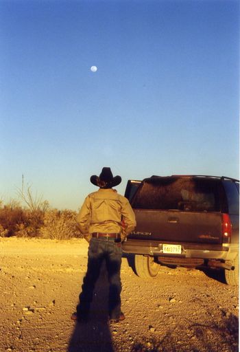 This is somewhere off of Highway 90 in West Texas, near Marfa. I took this shot of Jack lookin’ at the moon after he took that shot of me.
