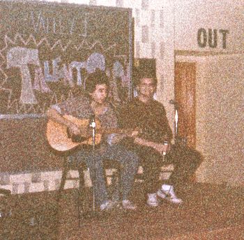Kalamazoo, Michigan.  Diamond Dave Wright and me performing in a talent show.  The song was “Seagull” by Bad Company.  We won a dozen doughnuts, I’m not joking.
