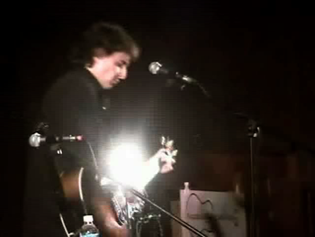 Screen capture from a videotape of my opening set for Dave Alvin at the Acoustic Music San Diego Concert Series at the Normal Heights Methodist Church.  Video by Kurt Mahoney
