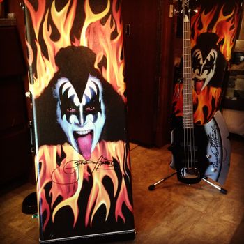 Fernanda's Bass case on the left, and her bass on the right. Both signed by Gene Simmons.
