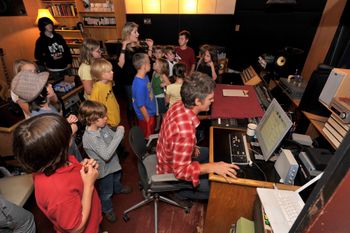 Here's an afternoon of chaos at Alex the Great Recording. The Vine Street Kids are in to sing on "Ashes to Ashes" and we're in the control room for playback. The kids had strict orders: Sing beautifully and do not touch anything.
