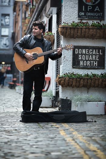 Michael Cunningham Singer-songwriter busking  Belfast
